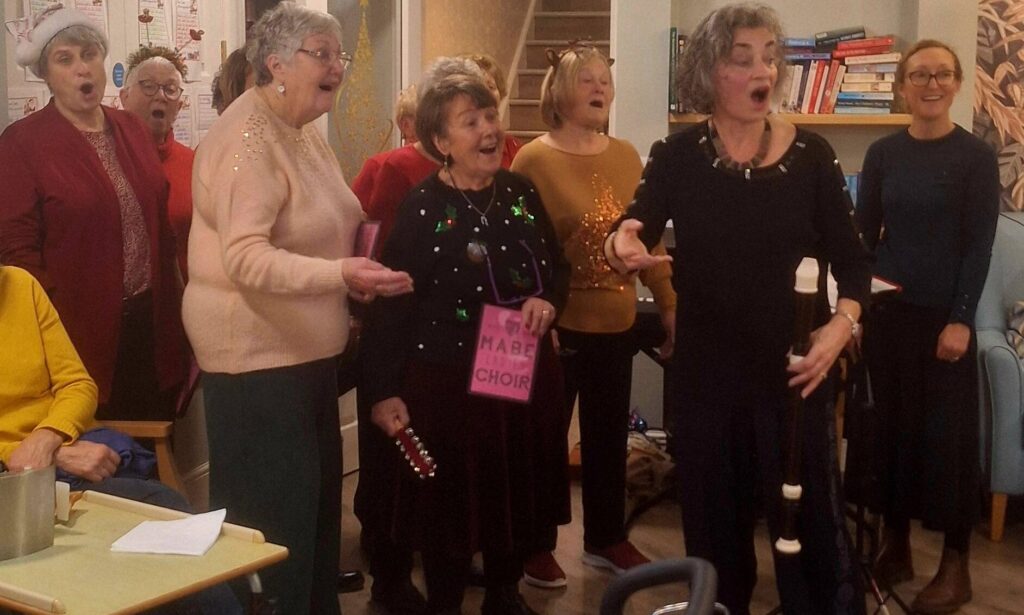 Amberley House residents joining the carol group