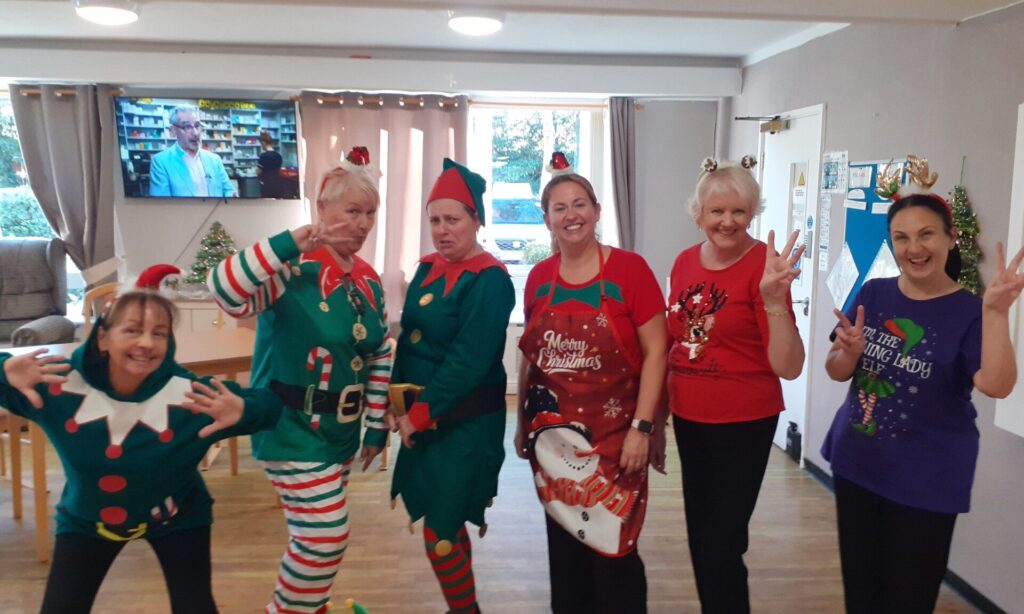 Astbury Lodge staff dressed up as elves