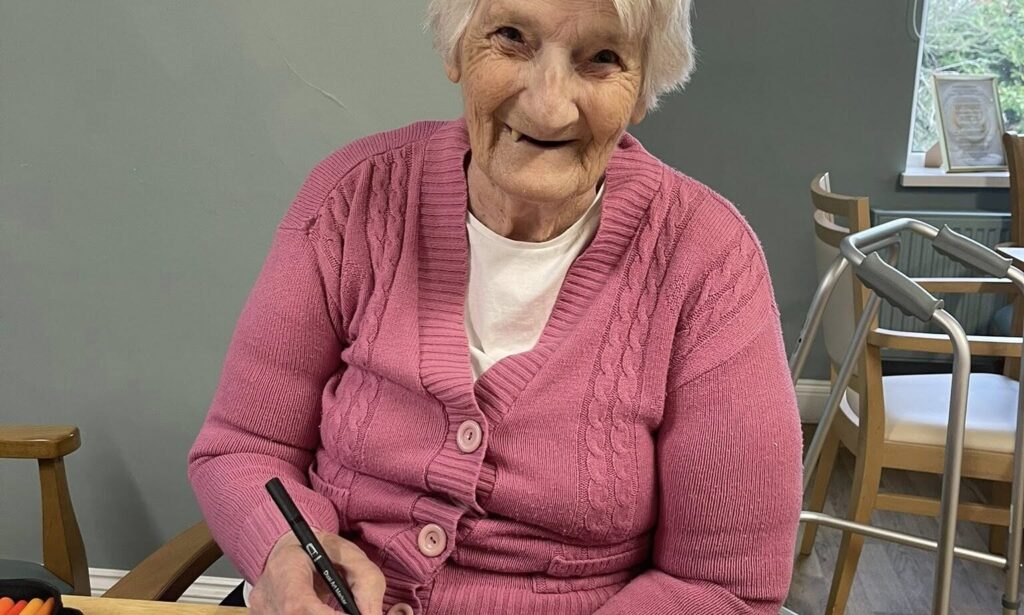 Cheaney Court resident enjoying Christmas Craft session