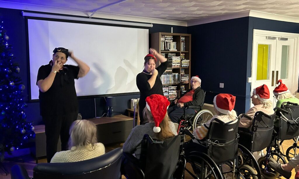 Grenville Court staff giving safety directions to the residents like air hostesses