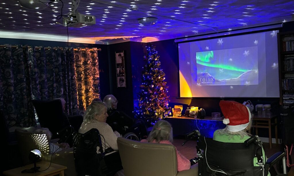 Grenville Court Residents enjoying their virtual trip to the northern lights
