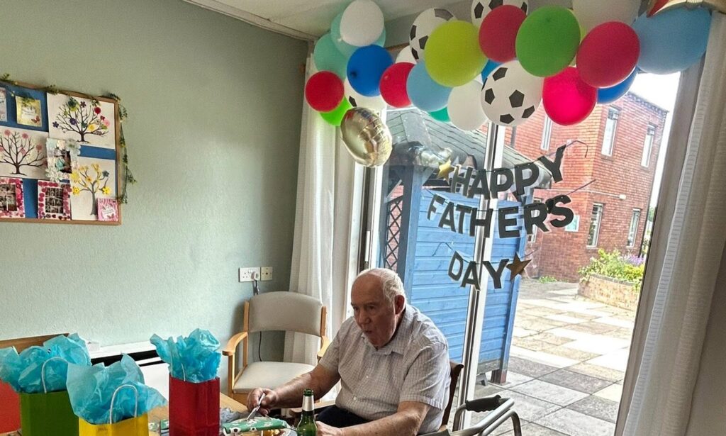 Dining room decorated with Happy Father's Day balloons and banners at Crossways