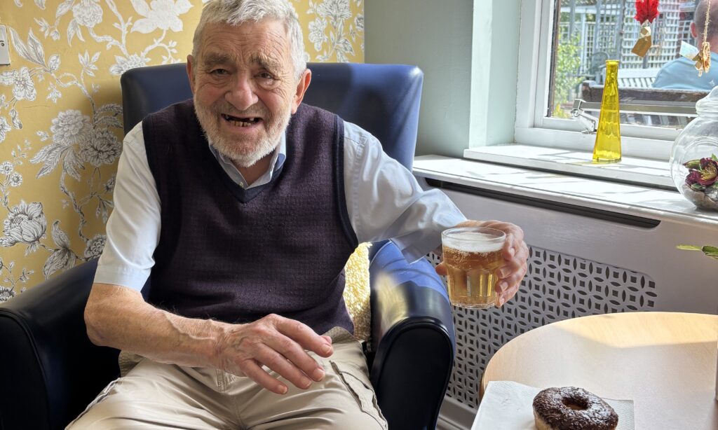Residents and family members celebrating Father's Day together at Wealstone